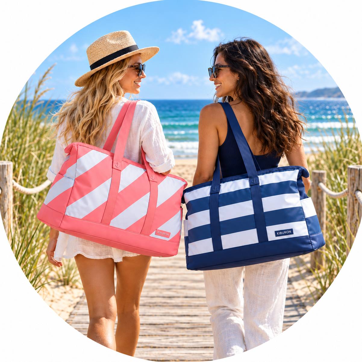 Kiburon pink and navy beach bags on a seaside boardwalk